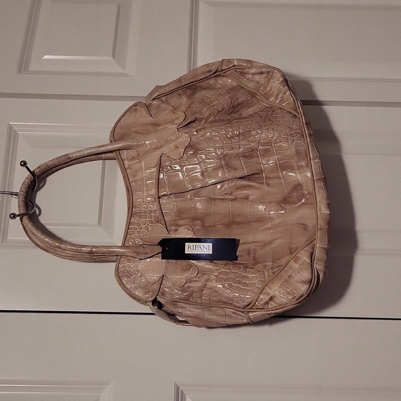 Rapani purse with flower on front new with tags - Picture 6 of 8